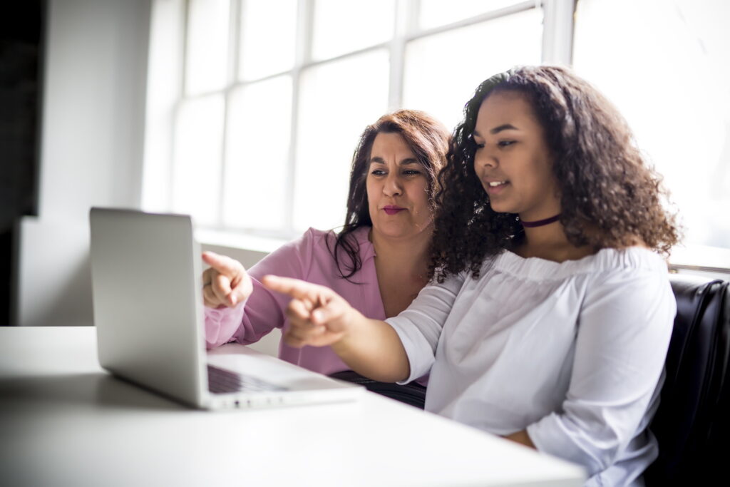 A parent teaching their child computer programming using the Coding Foundations curriculum